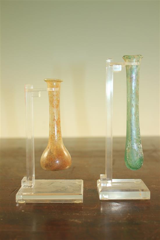 Two Roman glass unguentarium, c.2nd century A.D., 12.5 and 9.5cm